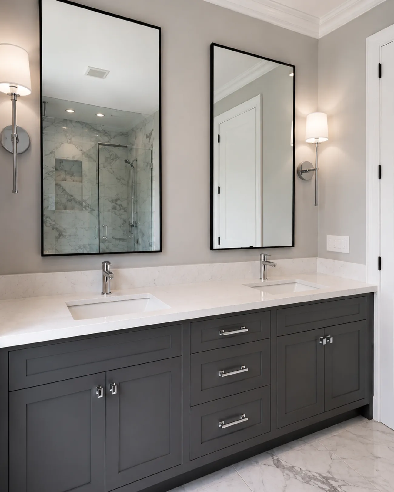 Custom gray vanity cabinetry with quartz countertop
