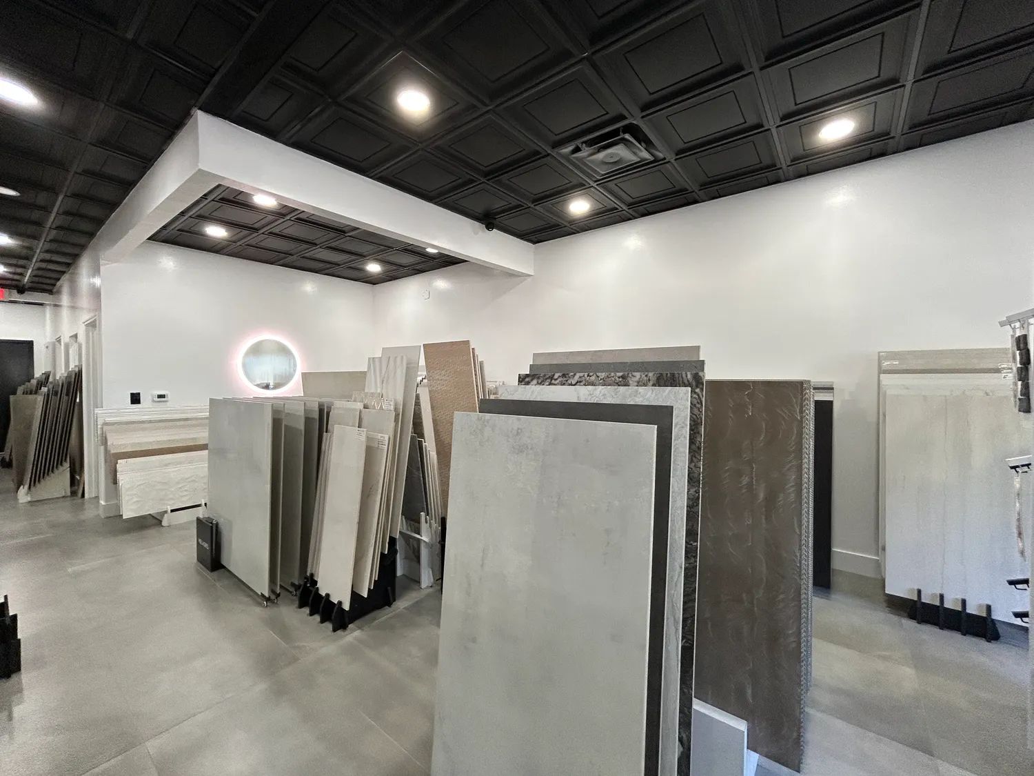 Interior of the Vetromani tile showroom in Pompano Beach with tile and stone displays