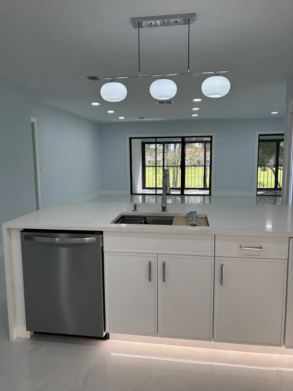 White Kitchen with Refrigerator Wall