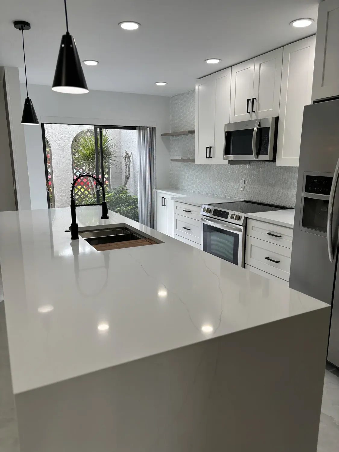 White Kitchen with Arched Garden Window