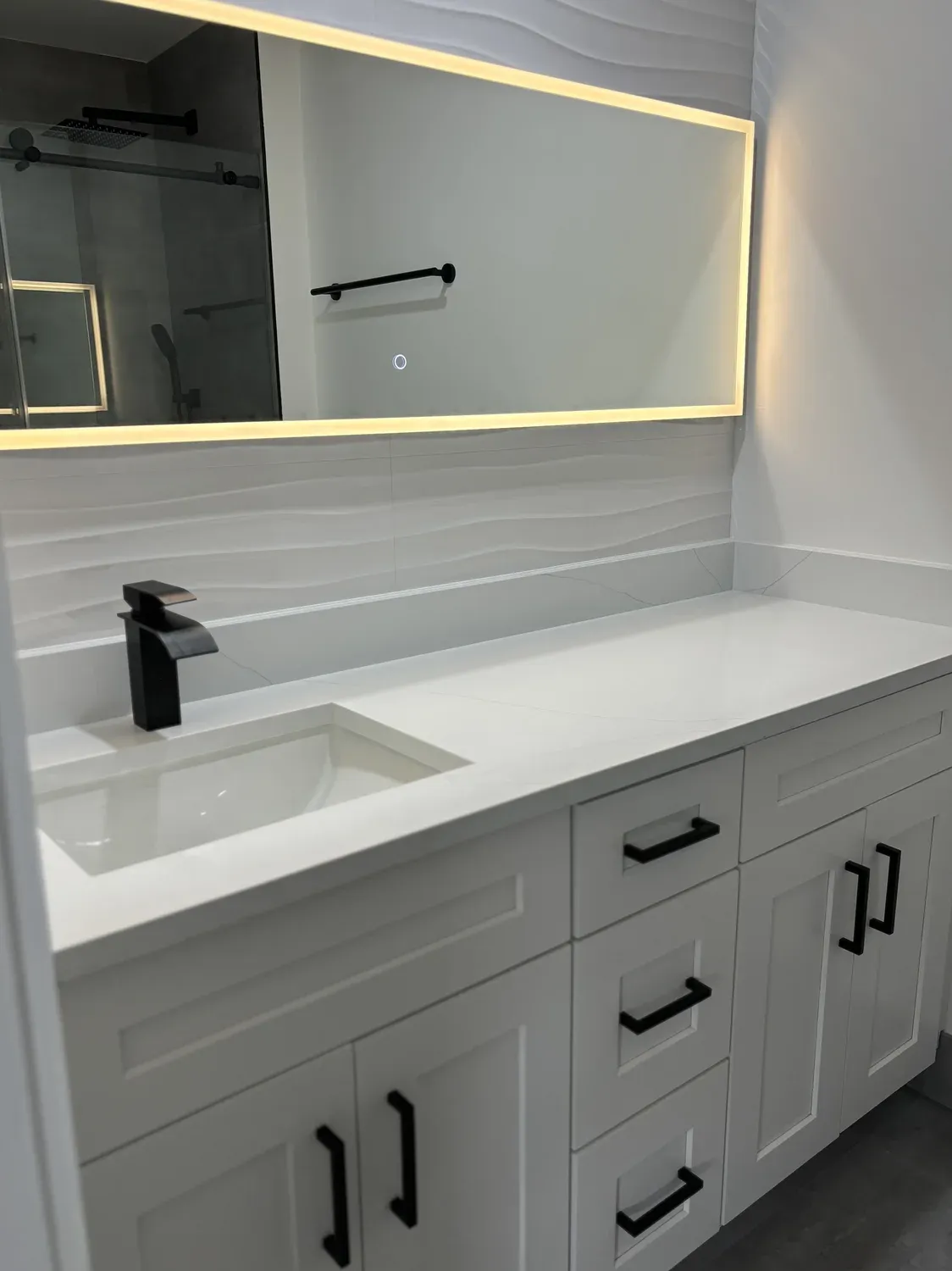 Vessel Sink Bathroom with Backlit Mirror