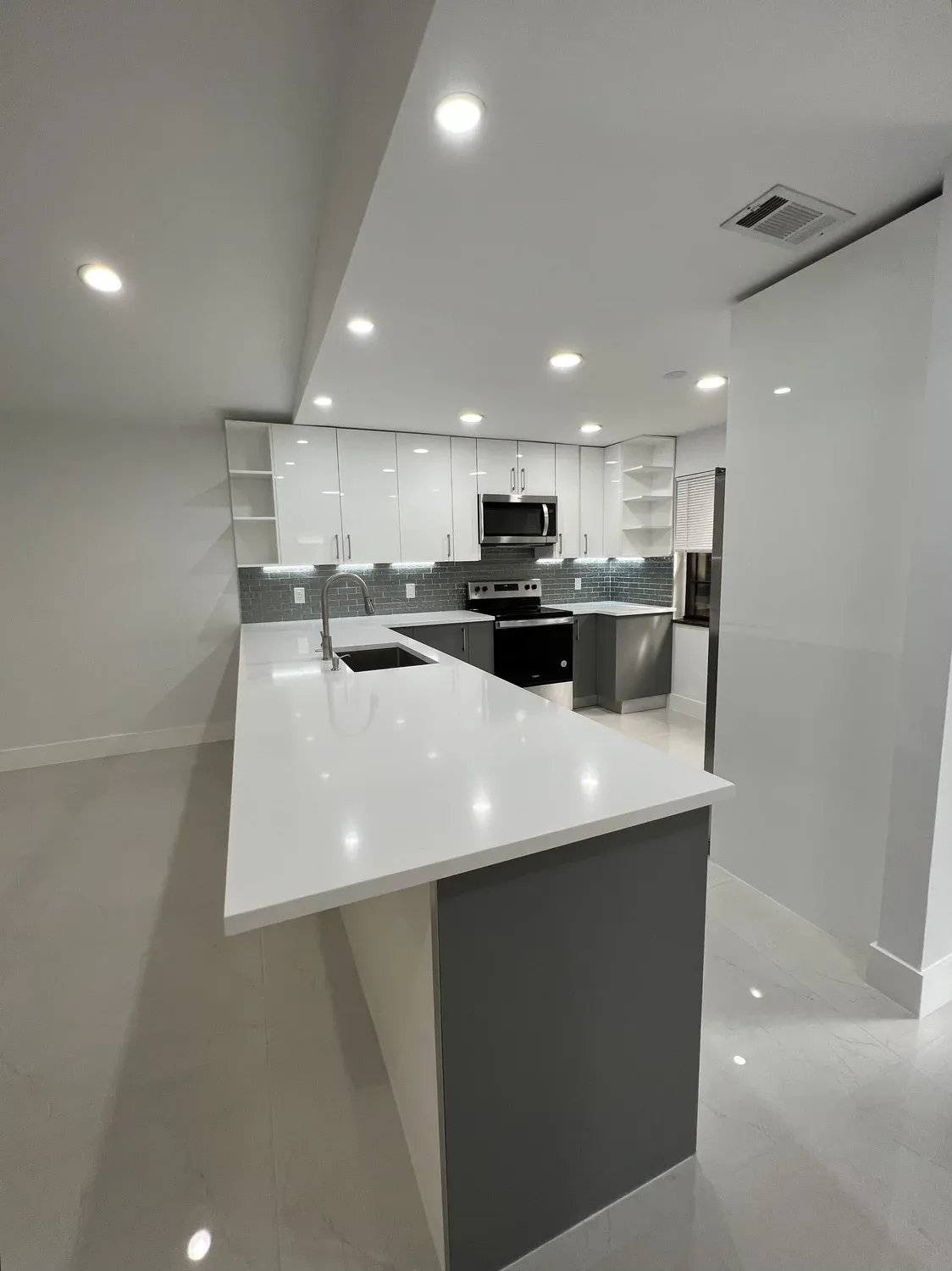 High-Gloss White Vanity & Linen Tower
