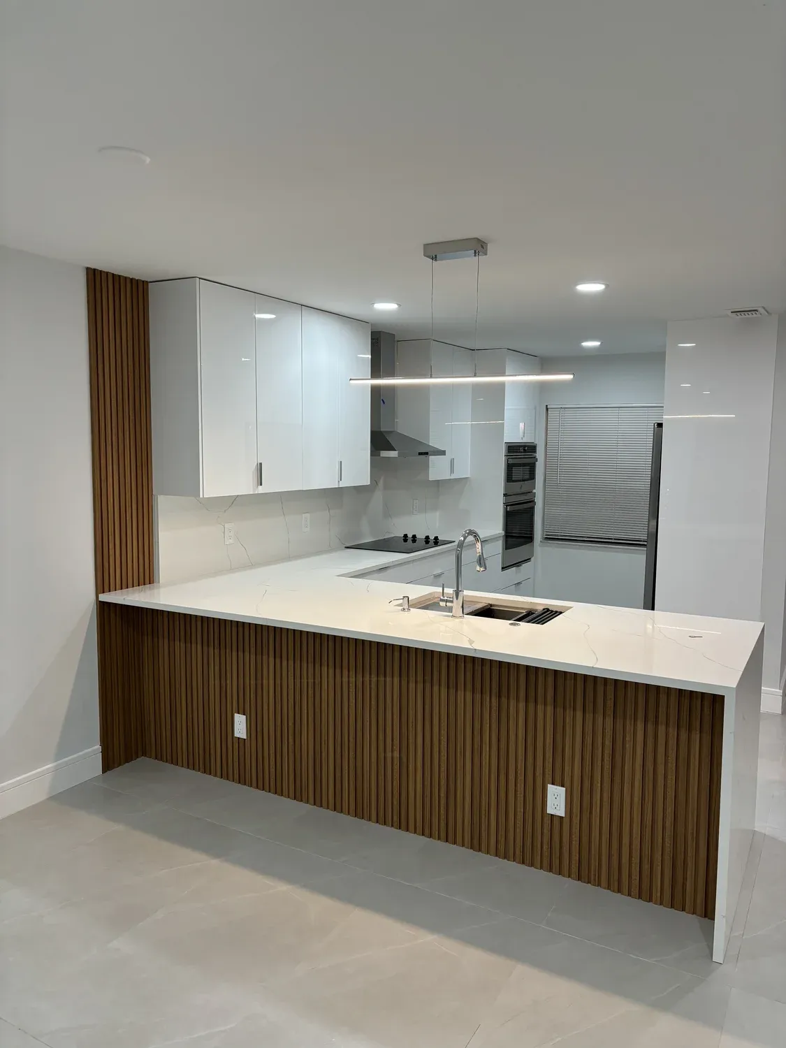 Wood Slat Waterfall Island Kitchen